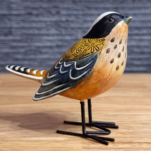 Hand carved bird - hand,